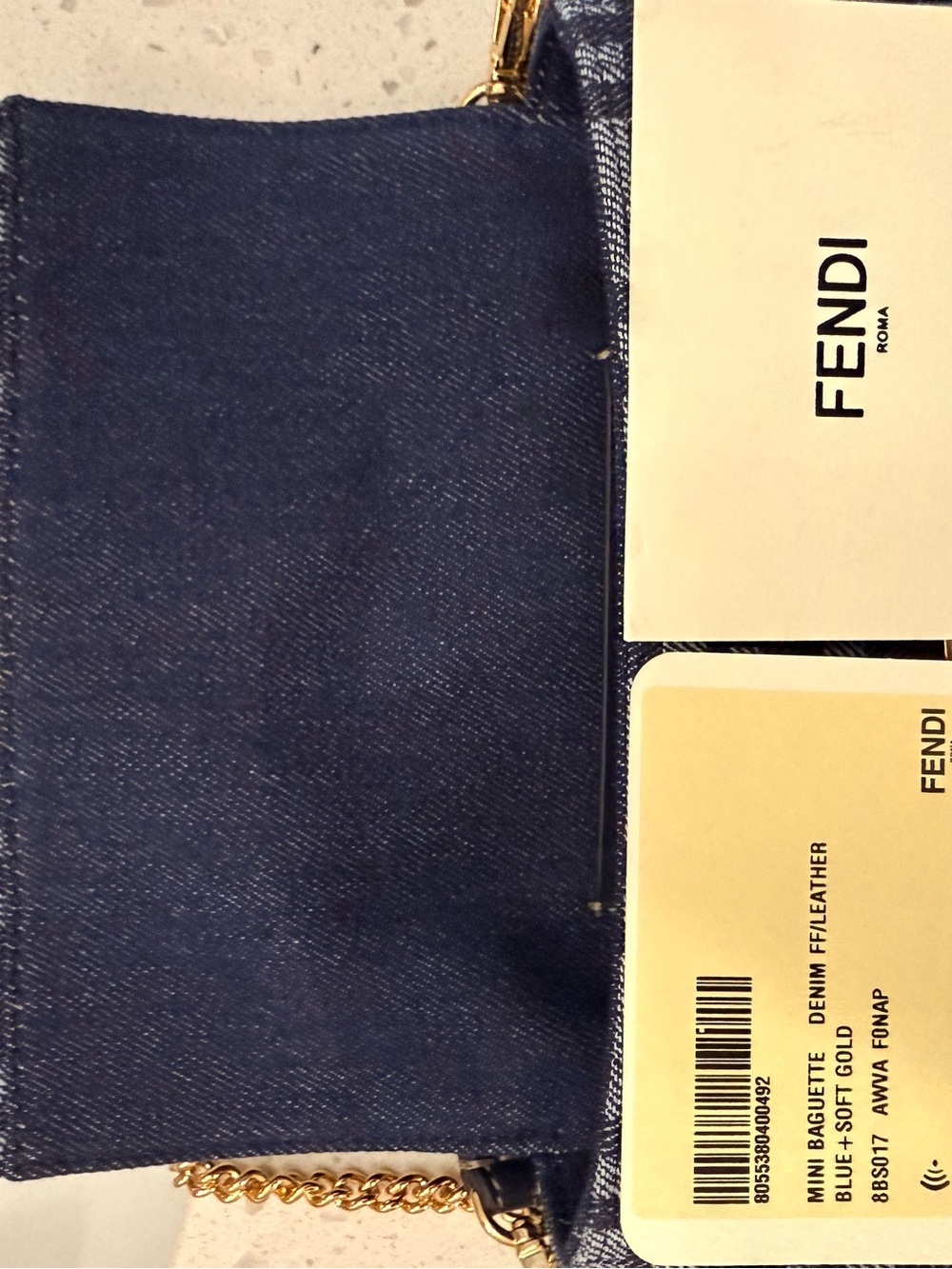 Fendi Baguette Mini
Dark blue denim-effect FF jacquard bag - Picture 10 of 12